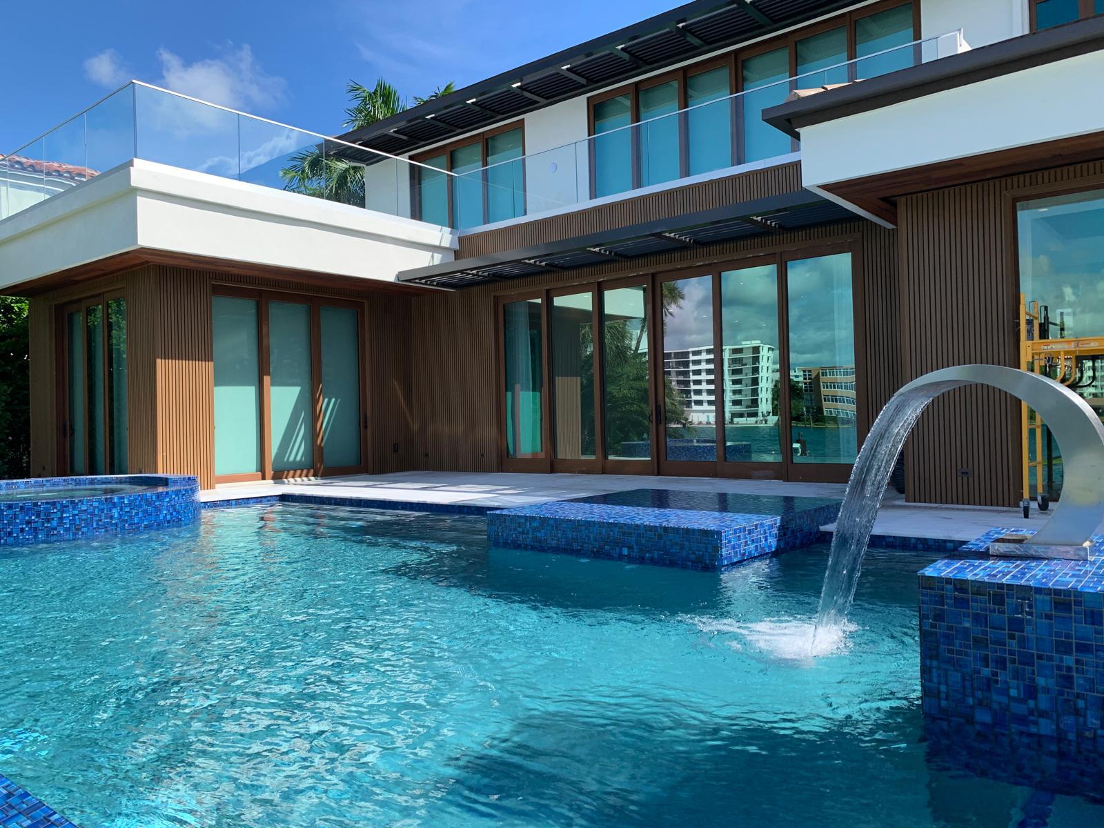 Luxury pool and waterfront custom home in Miami by OD Construction Group Corp general contractor